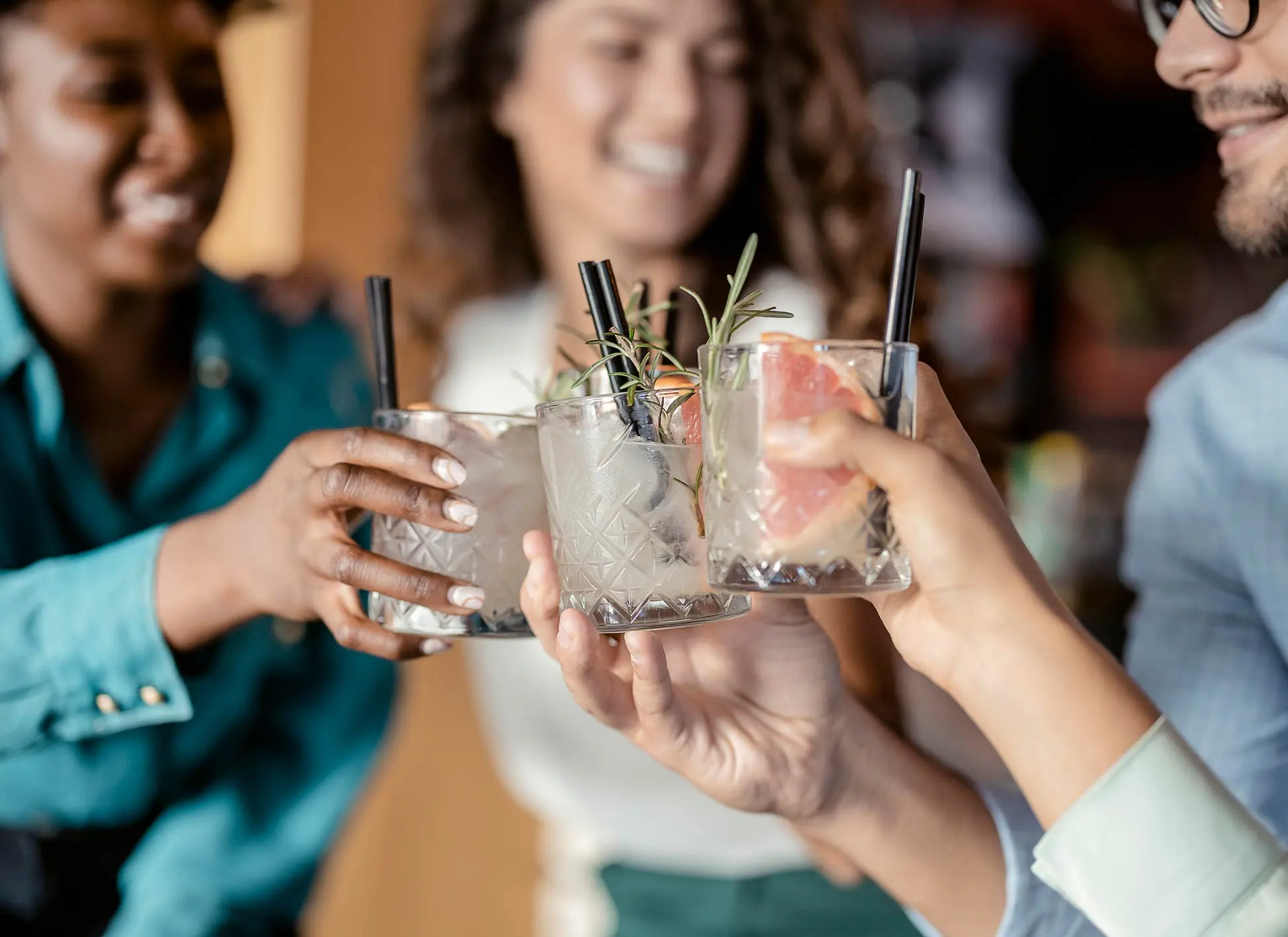 Young people enjoying a custom cocktail at one of our Savannah bars.
