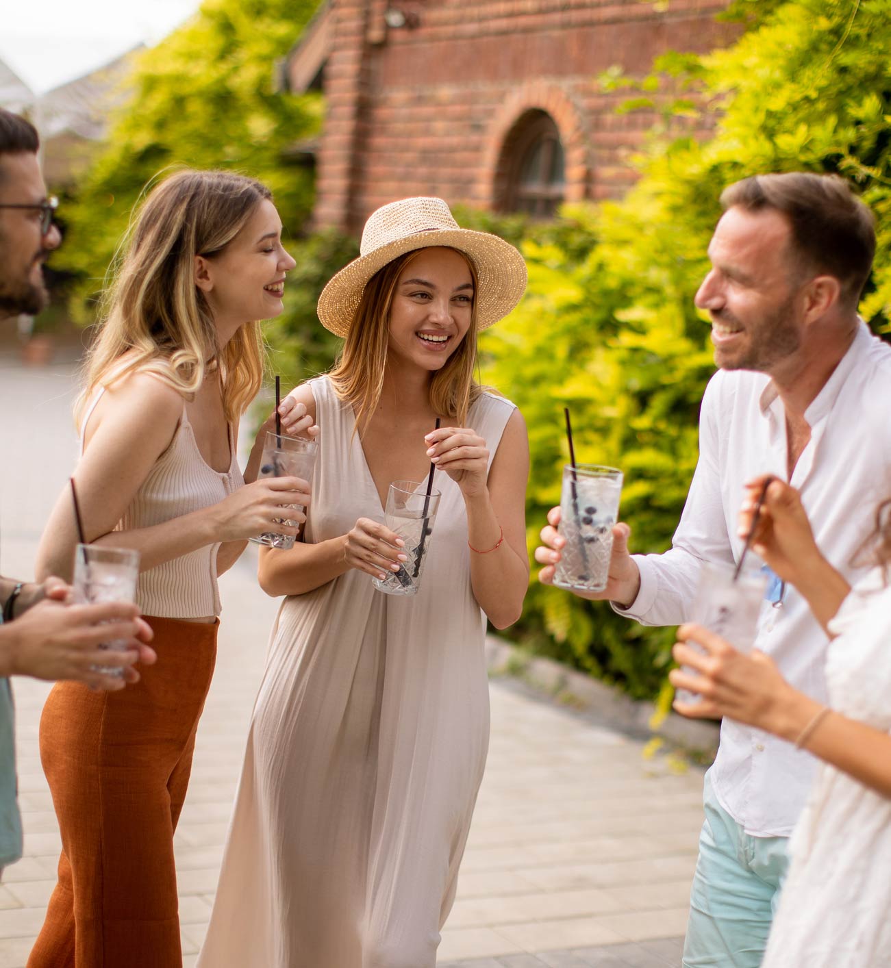 Guests on a Cocktail Tour laughing over a Tour Guide's Story in Charleston